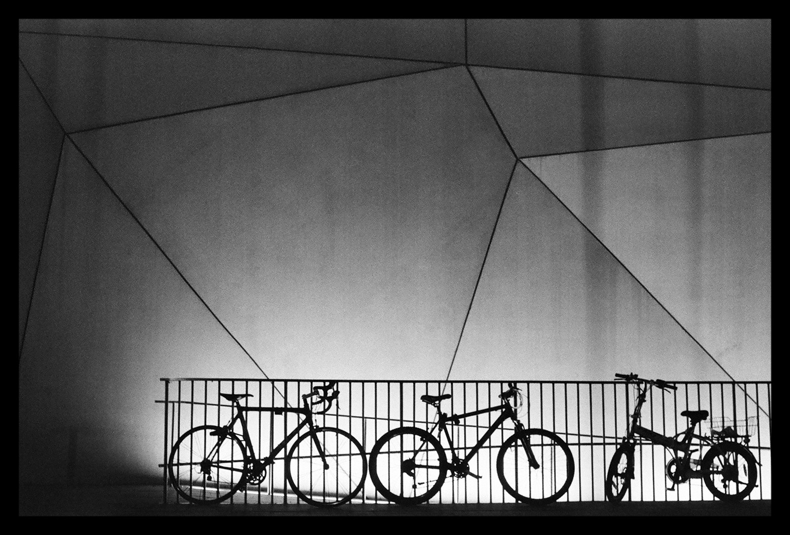 Bicycle parked outside Tel Aviv Art Museum. Black and white film.